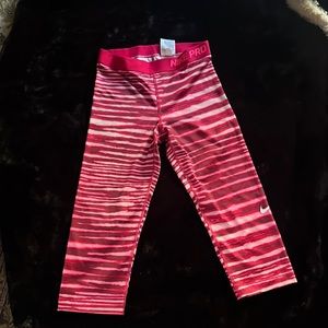 Nike pro crop leggings, size M, multiple red & pink shades